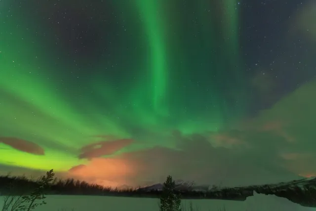 Northern lights in the Lyngenfjord Alps at the seventieth latitude