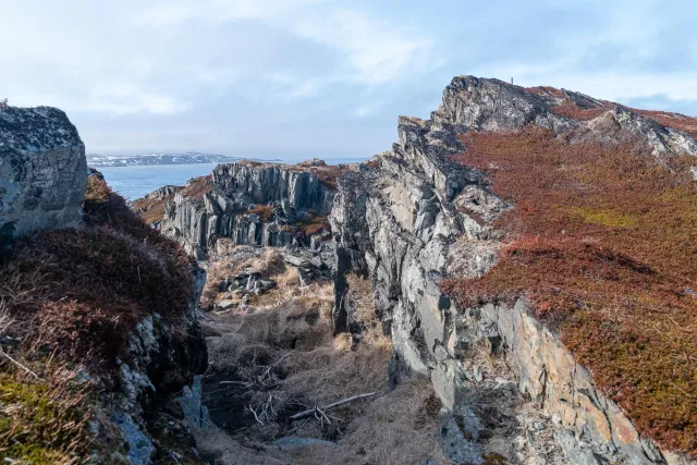 Climbing to the northern lighthouse in the north of Vardøya island