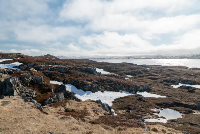 Climbing to the northern lighthouse in the north of Vardøya island