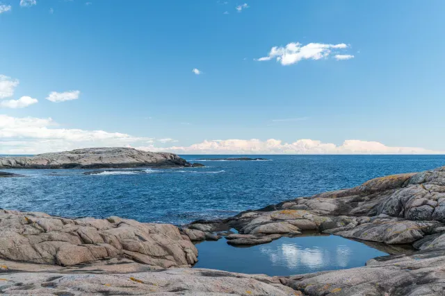 Wolken spiegeln sich am Skagerrak